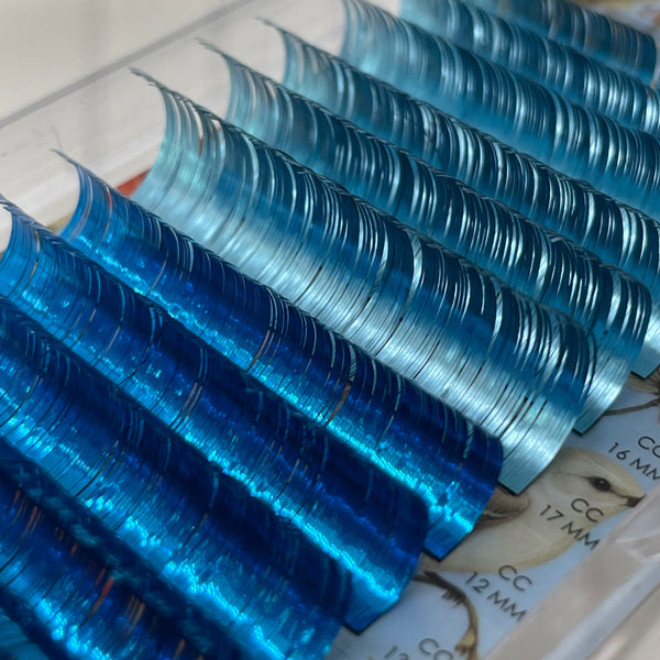 blue tinsel lashes, tinsel lash extensions, sparkling tinsel lashes, glitter lash look, blue holiday lashes, shiny lash extensions, holographic lash extensions, gold colored lashes, teal lash extensions, metallic blue eyelashes, blue lash trays, blue lash extensions, festival lash extensions, new lash trends, lash supplies, lash products