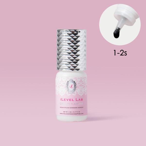 iLevel Lab Clear Lash Adhesive, 1–2 second drying time, transparent glue for seamless eyelash extension application.