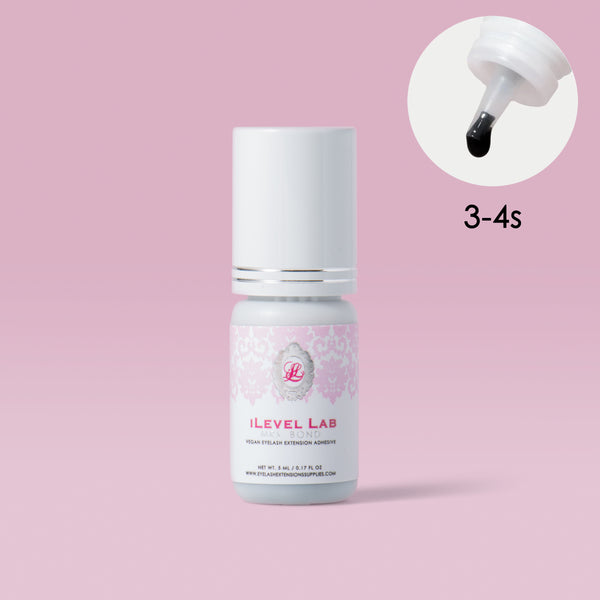 iLevel Lab Mrs. Bond Time Adhesive, 3–4 second drying time, soft pink packaging, reliable lash extension glue.
