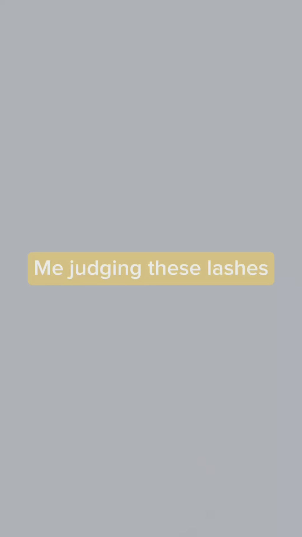 alt="Close-up video of iLevel Lab Anime Set lash tray, tweezers holding premade fans, model wearing anime lash extensions"
