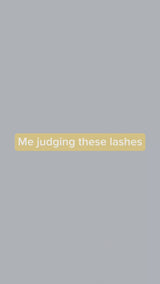 alt="Close-up video of iLevel Lab Anime Set lash tray, tweezers holding premade fans, model wearing anime lash extensions"